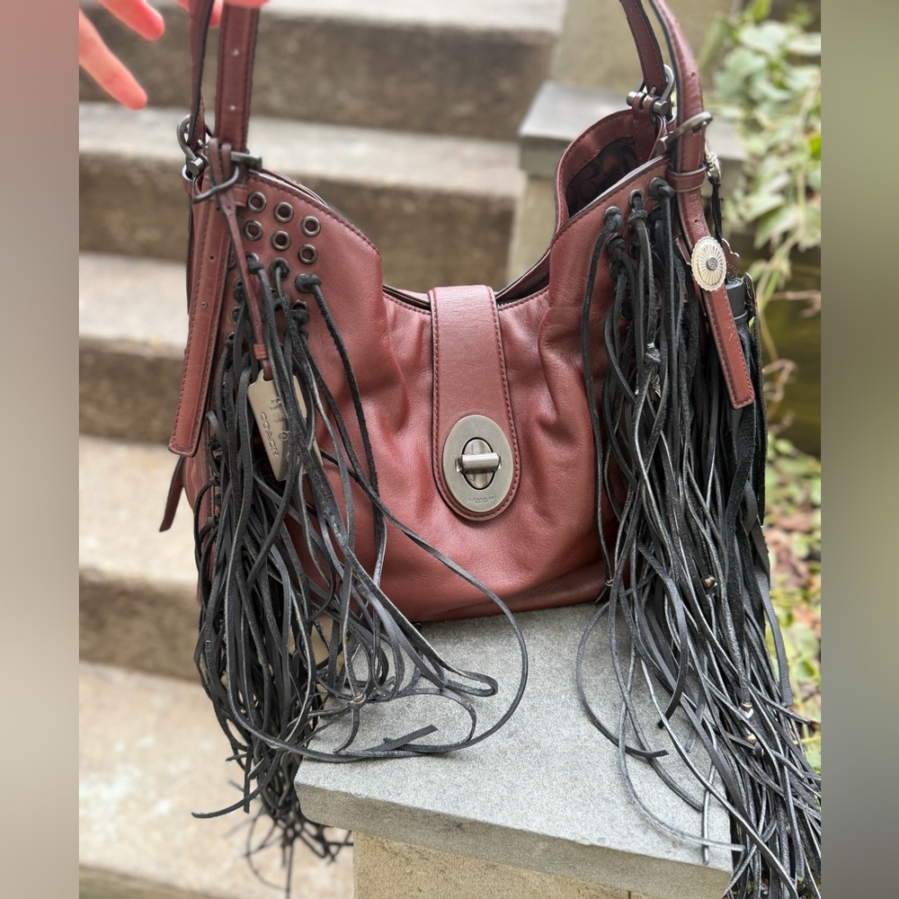 Extremely RARE EUC Coach large western grommet leather handbag with fringe